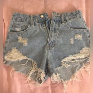 XXS shein jean shorts. Never worn and good condition